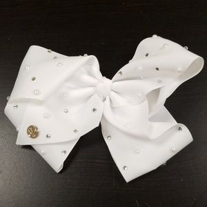 Jo-Jo Swisa large white bow rhinestoned
